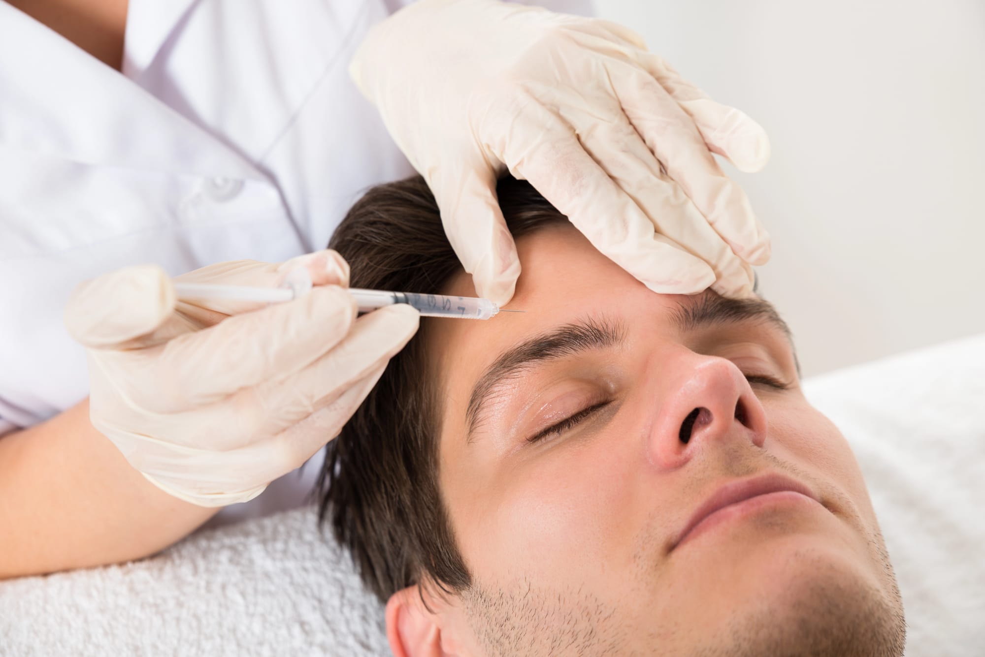 Man getting botox treatment